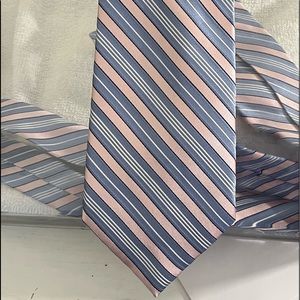 New condition mens Jones New York striped tie. Blue, pink & white.